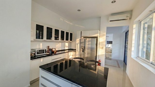 Fully equipped kitchen with a large central island